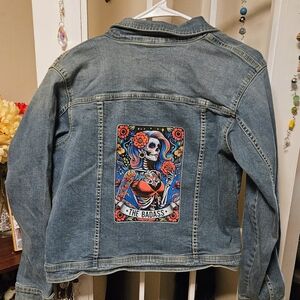 Edgy Blue Denim Jacket with Skull Patch